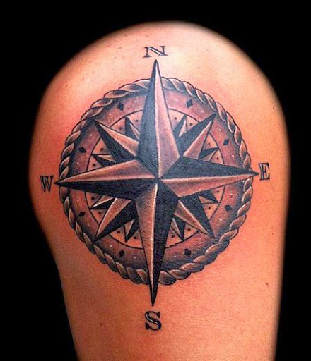 An Embellished Compass Tattoo