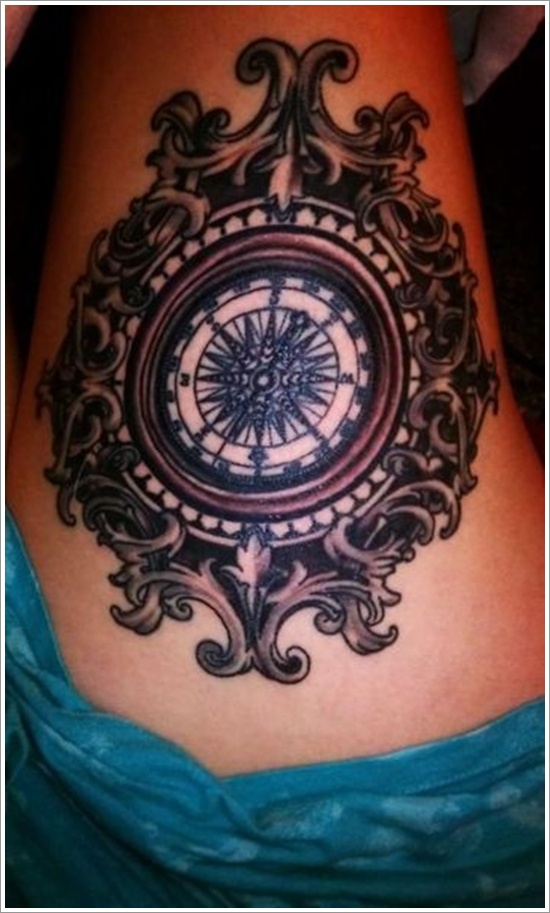 Intricate compass tattoo design