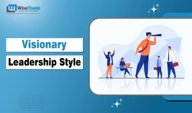 Visionary Leadership Style feature image showing a business leader looking through a telescope towards a growth arrow, representing strategic foresight and team direction.